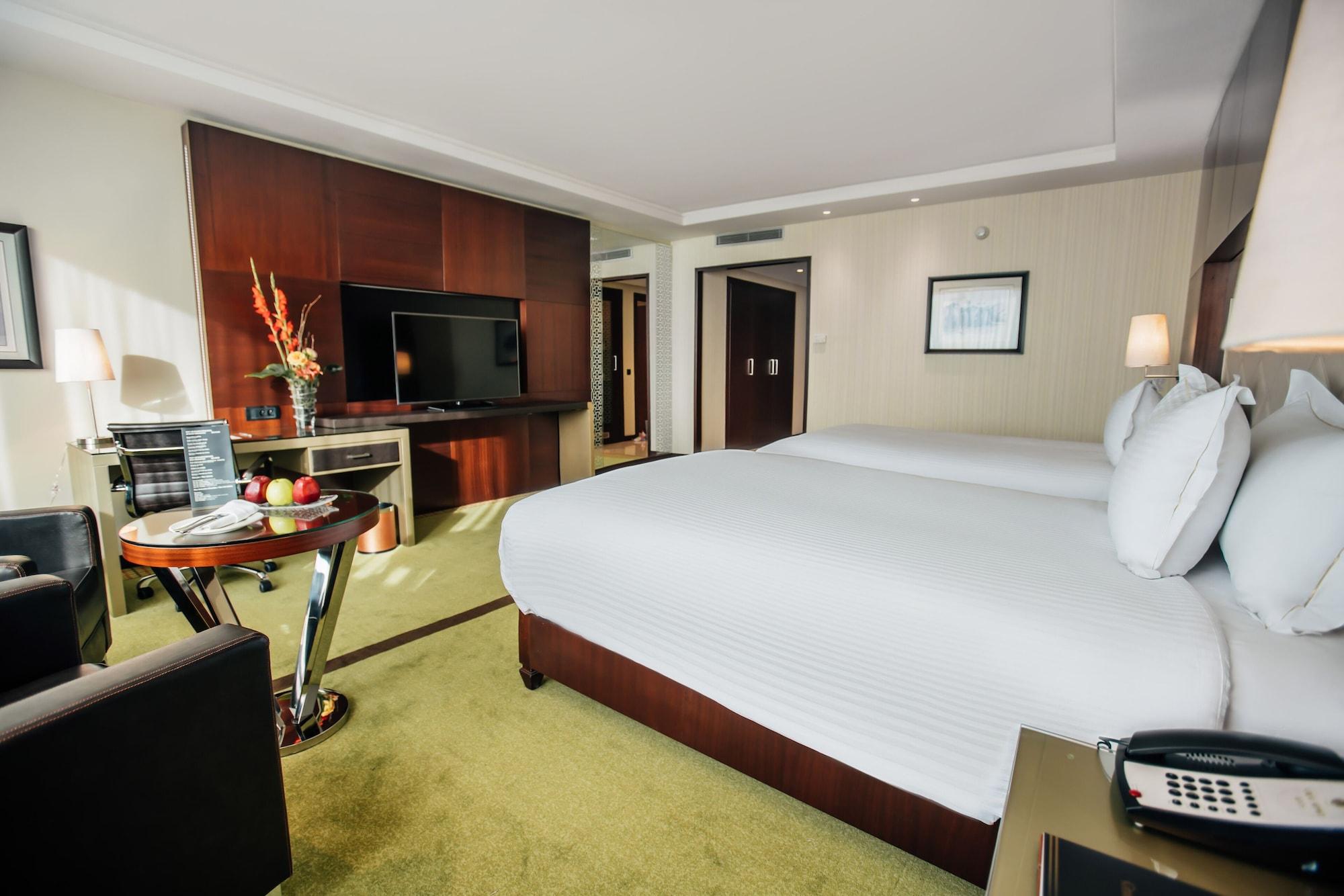Grand Mogador City Center Casablanca Kültér fotó A room at the hotel