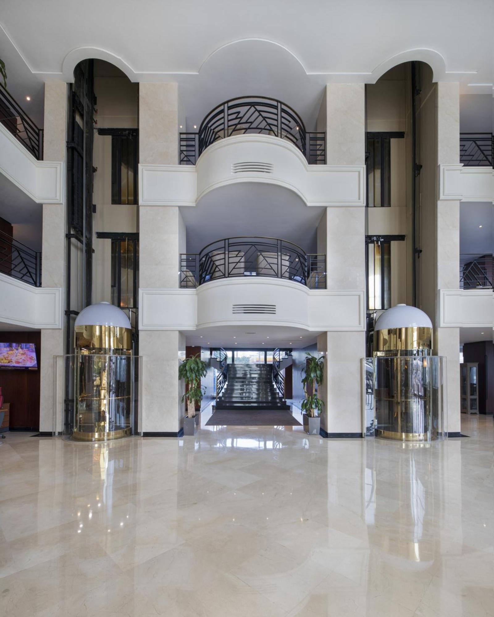 Grand Mogador City Center Casablanca Kültér fotó Interior of the hotel