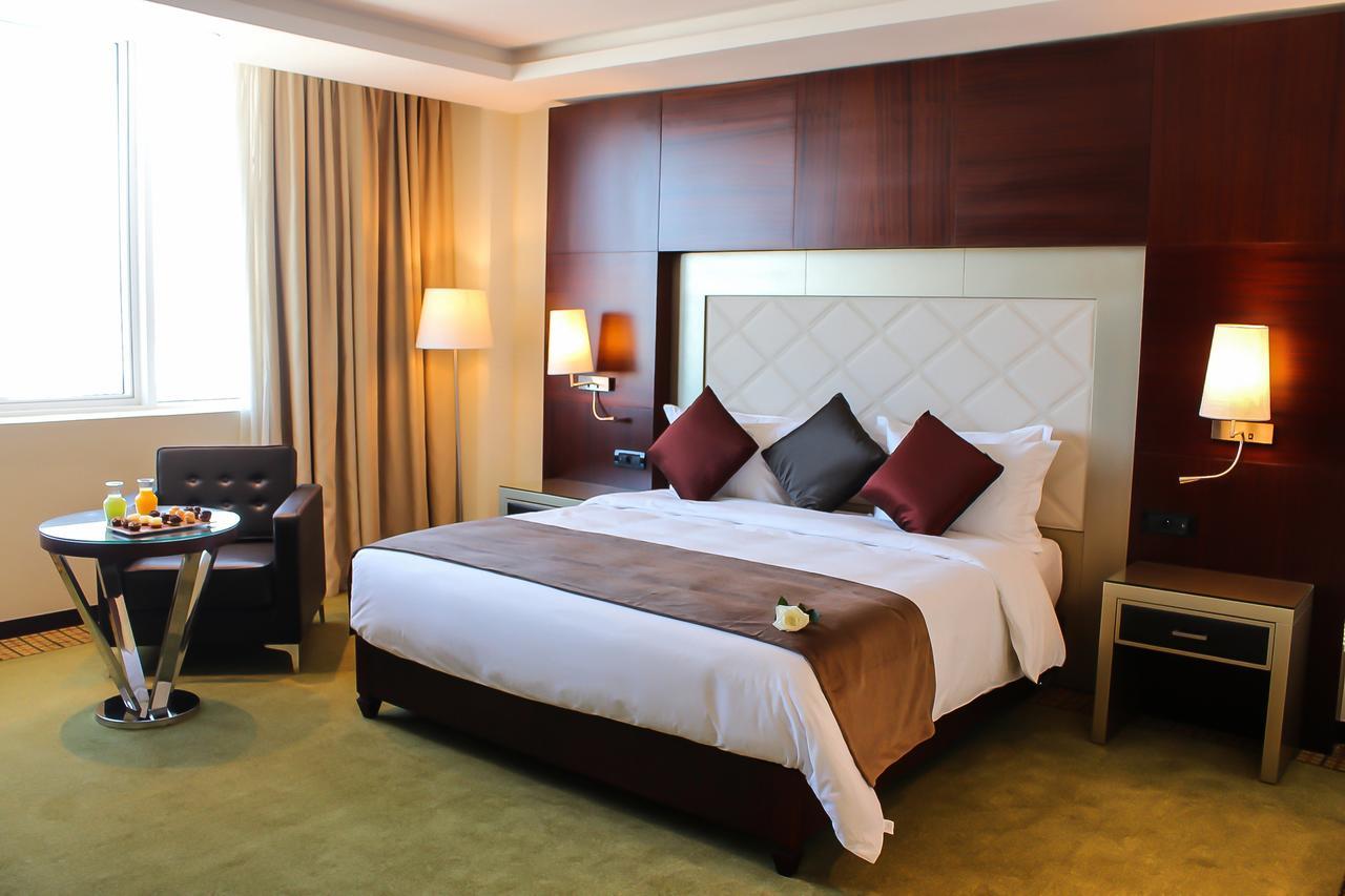 Grand Mogador City Center Casablanca Kültér fotó A room at the hotel