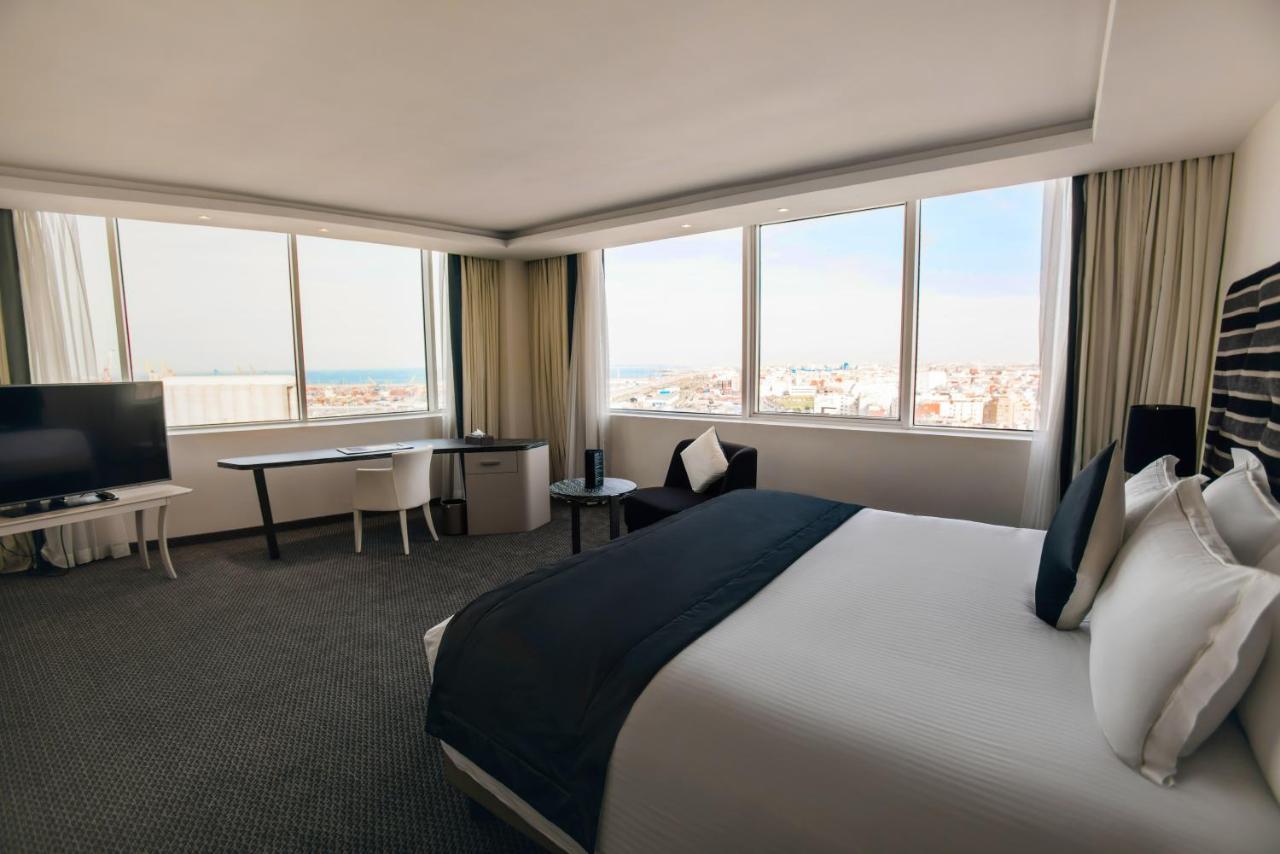 Grand Mogador City Center Casablanca Kültér fotó A room at the hotel